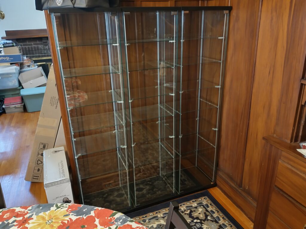 Three IKEA Detolf Shelves
