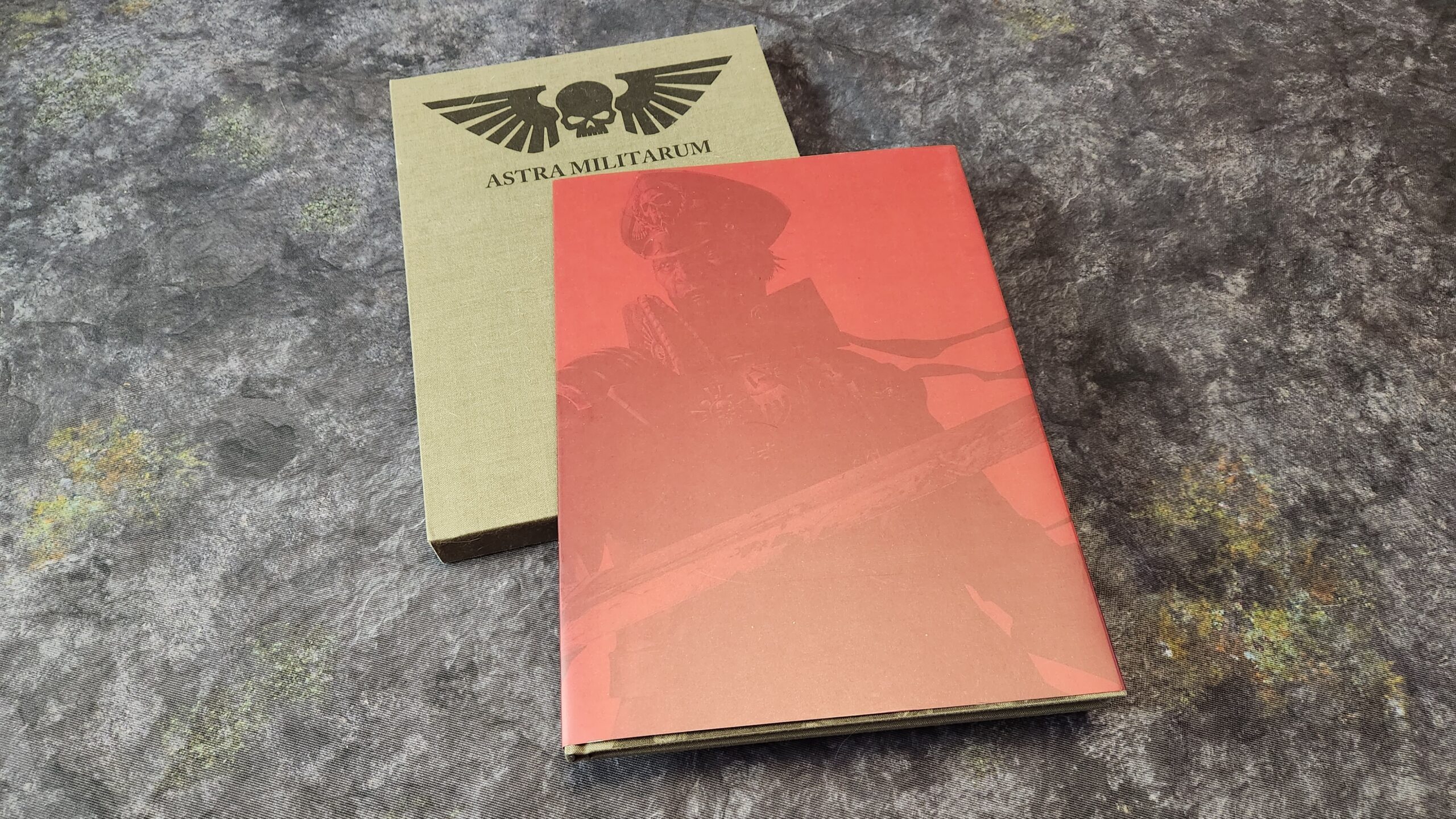 A picture of the Astra Militarum limited edition codex and slipcover.